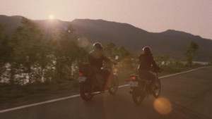 His Motorbike, Her Island háttérkép