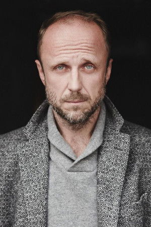 Łukasz Simlat profil kép