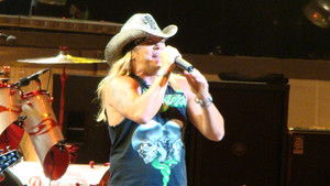 Poison: Live, Raw & Uncut háttérkép